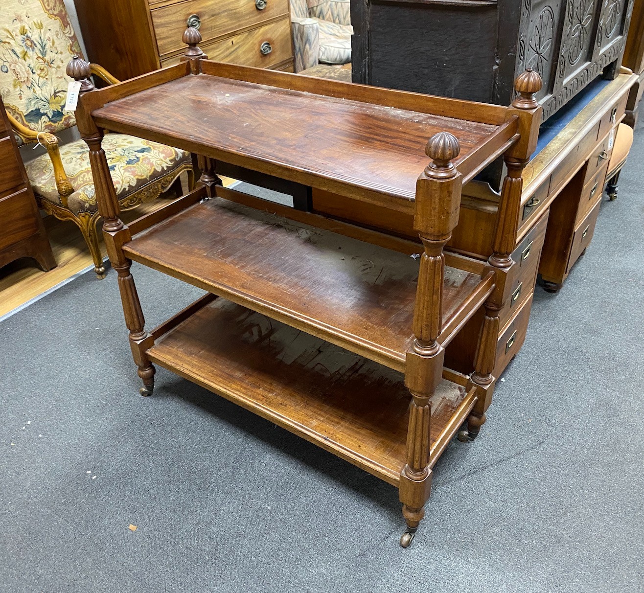 A Victorian mahogany three tier buffet, width 102cm, depth 44cm, height 109cm